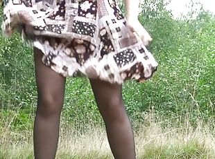 Stockings girl pissing outdoors for relief