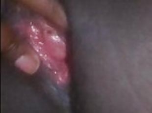 Black ebony milf feeling horny while fingering her pink sexy tight pussy after a long day working.