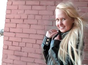 Flashing teen in skirt and leather jacket