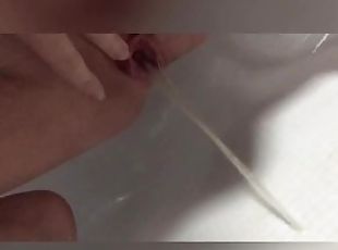 Russian schoolgirl pissing in the shower