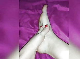 My wife play with her feet