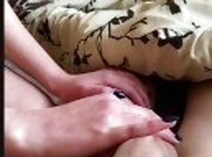 Masturbates his dick with her hand so that he then fucks her