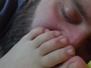 Sniffing and licking her dirty feet