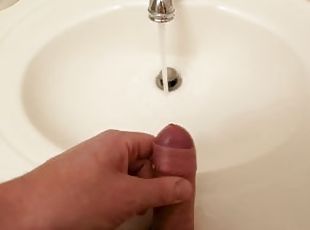 Close up while masturbating and cum or ejaculate into the bathroom sink.